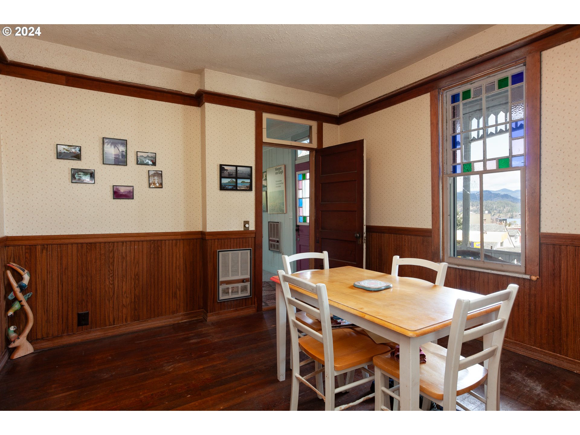 1 State Street Hood River, OR 97031 - Photo 37 of 47 a view of a dining room with furniture window and wooden floor