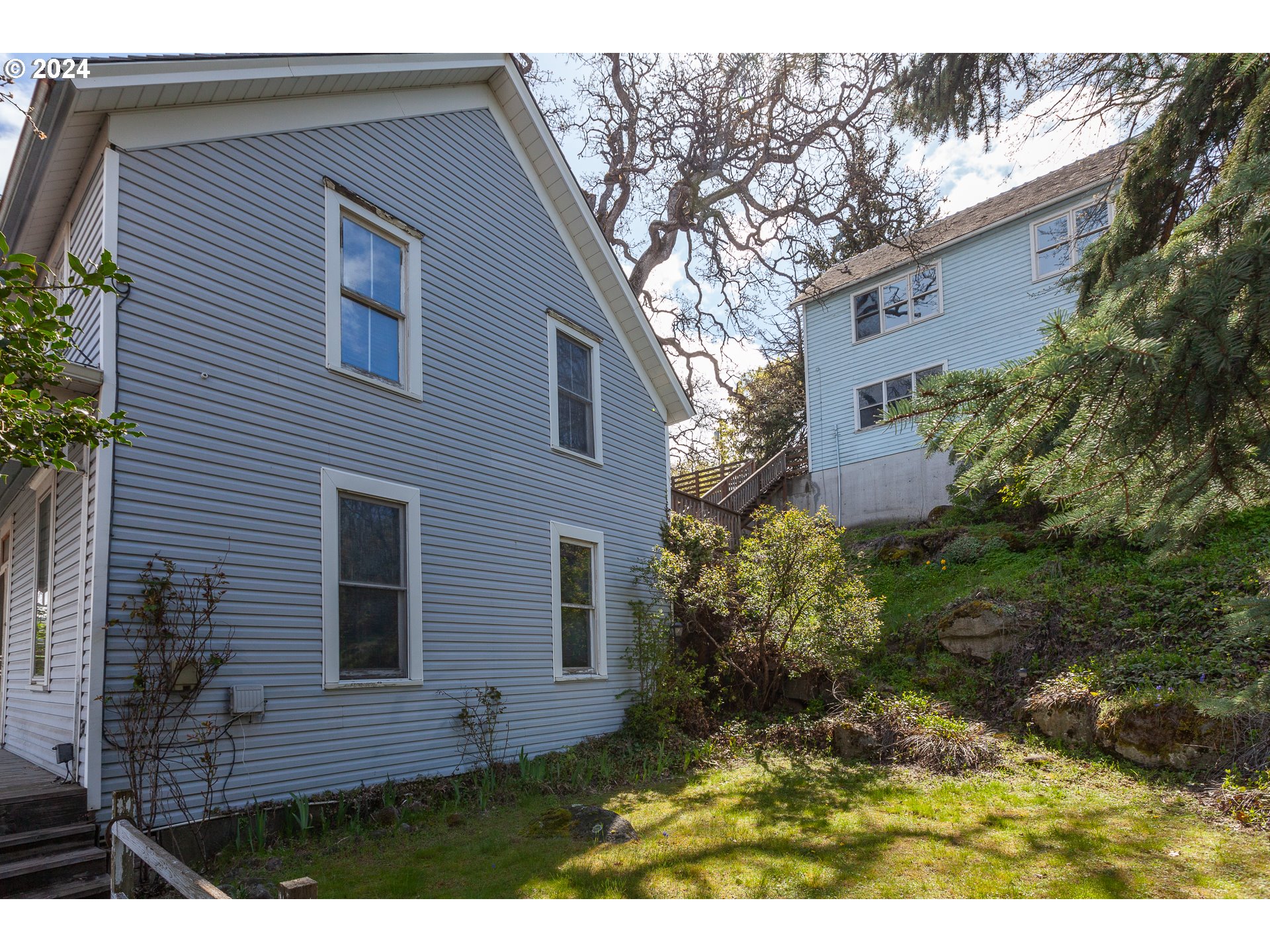 1 State Street Hood River, OR 97031 - Photo 45 of 47 a view of a house with a yard
