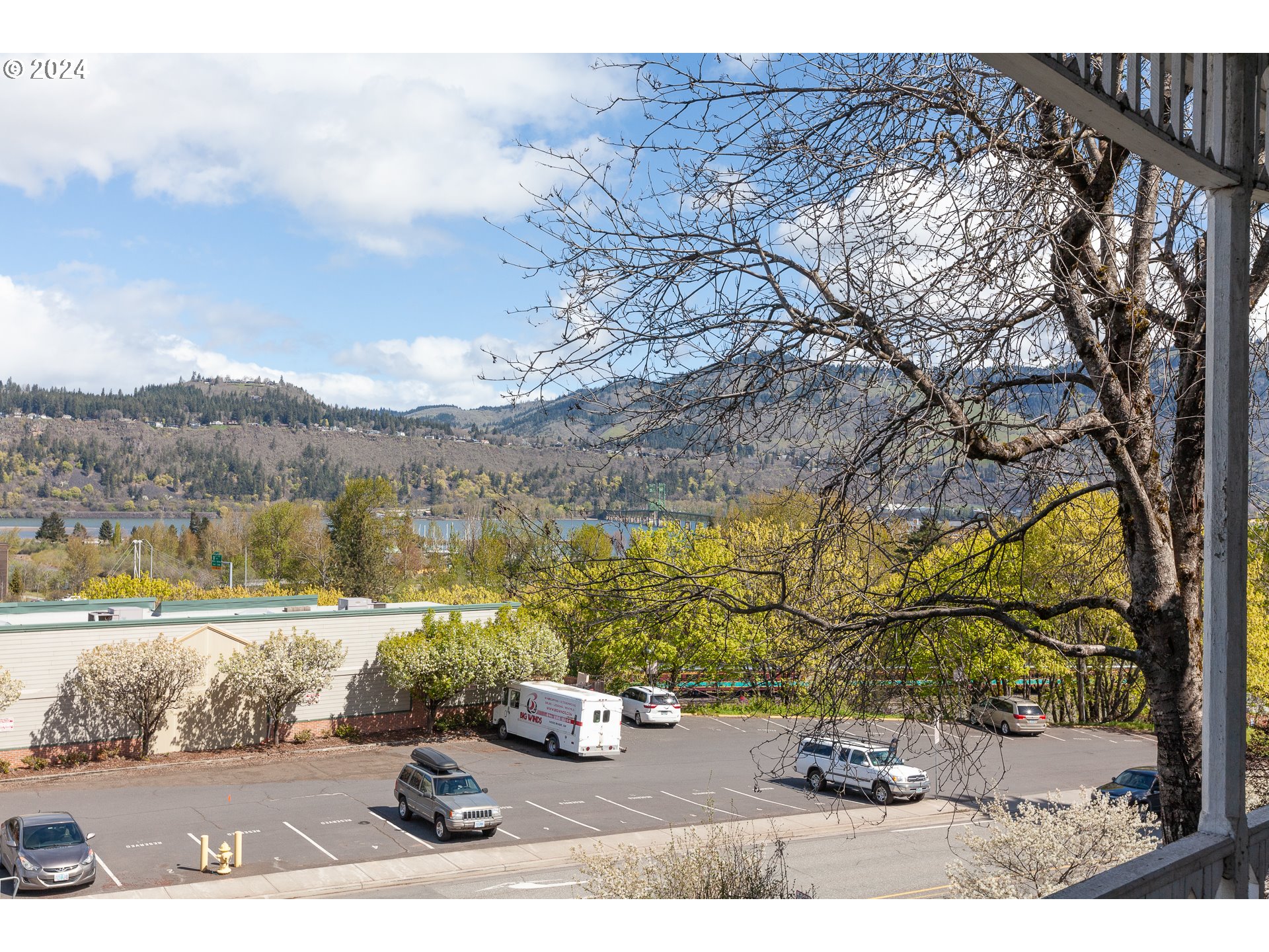 1 State Street Hood River, OR 97031 - Photo 47 of 47 a view of yard with mountain and trees in the background