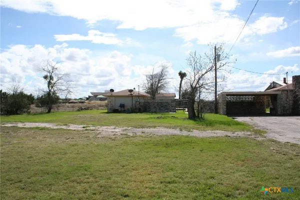 a view of outdoor space and yard