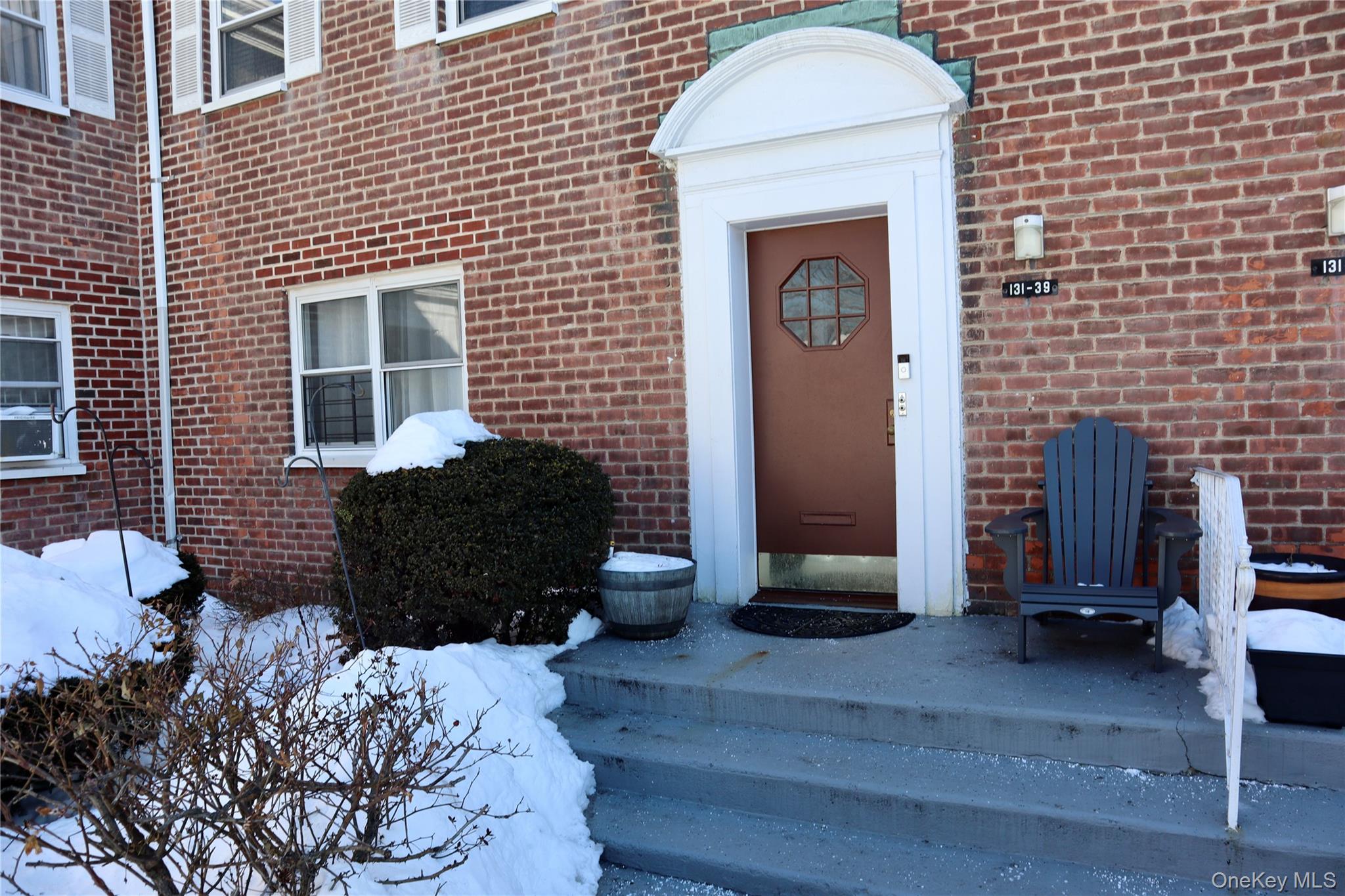 a front view of a house with a door