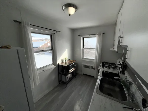 a room with furniture and a window