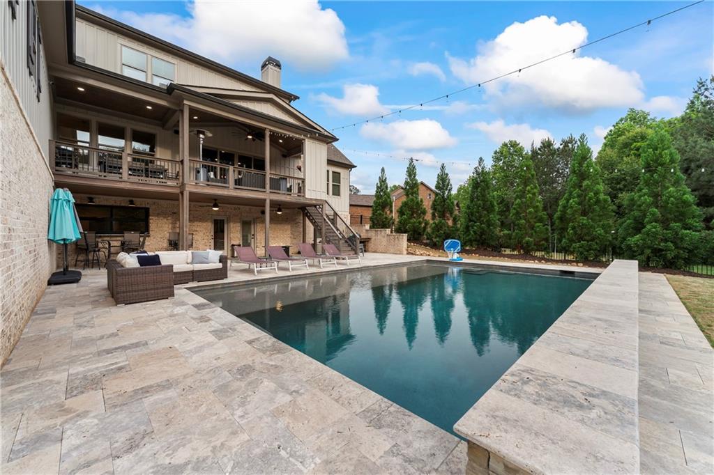 4726 Crestview Way Flowery Branch, GA 30542 - Photo 43 of 48 a view of swimming pool with outdoor seating and plants