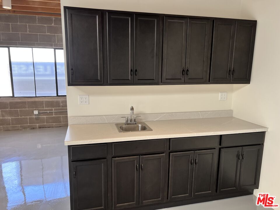 3751 South Robertson Boulevard Culver City, CA 90232 - Photo 6 of 7 a bathroom with a sink and a mirror