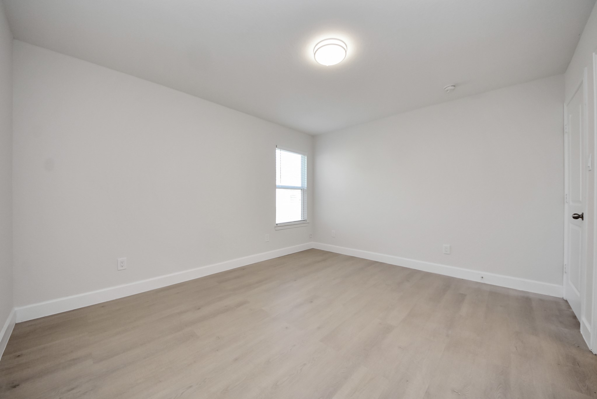16124 Brettwood Lane Splendora, TX 77372 - Photo 16 of 40 an empty room with a window