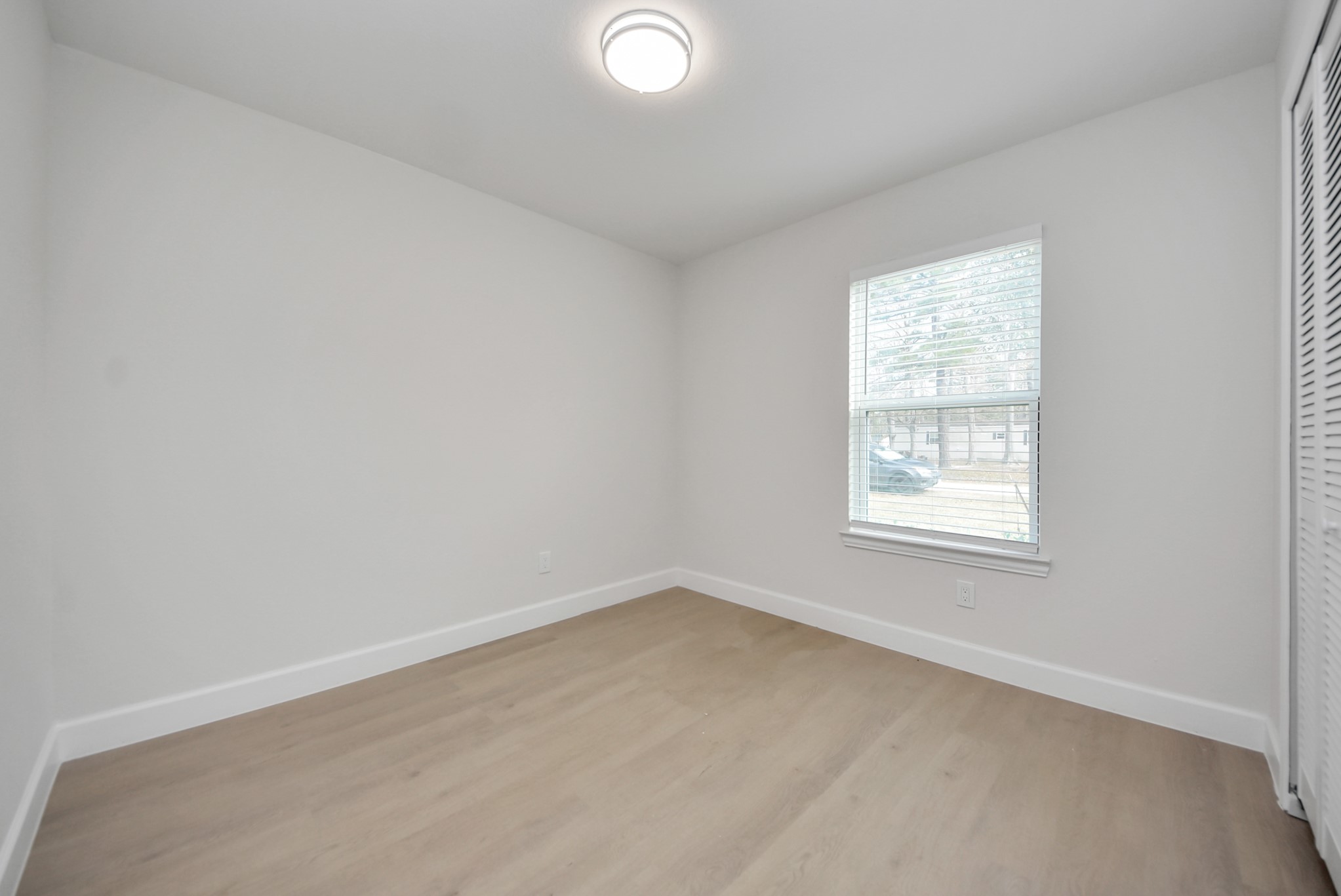 16124 Brettwood Lane Splendora, TX 77372 - Photo 22 of 40 an empty room with a window