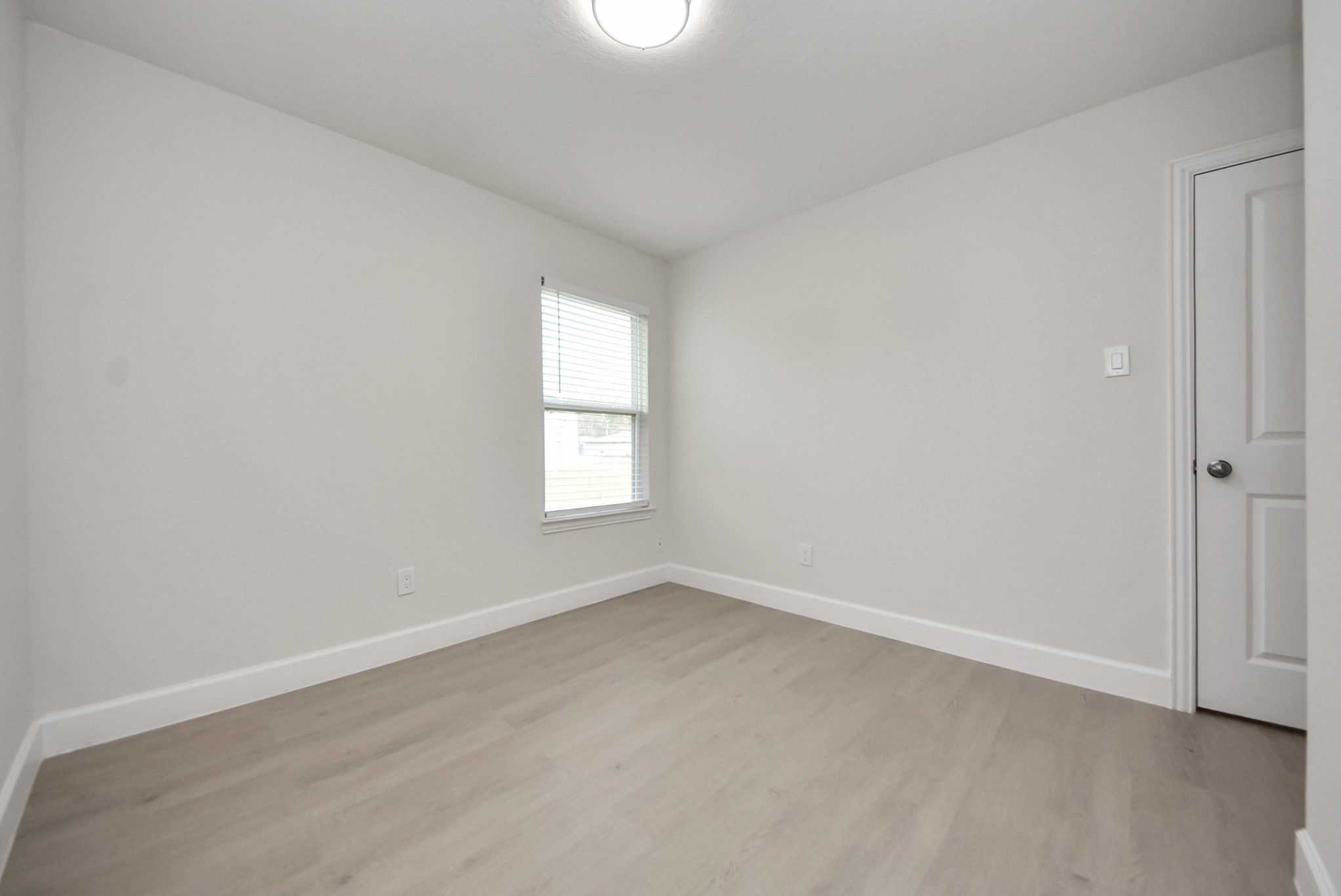 16124 Brettwood Lane Splendora, TX 77372 - Photo 26 of 40 an empty room with a window