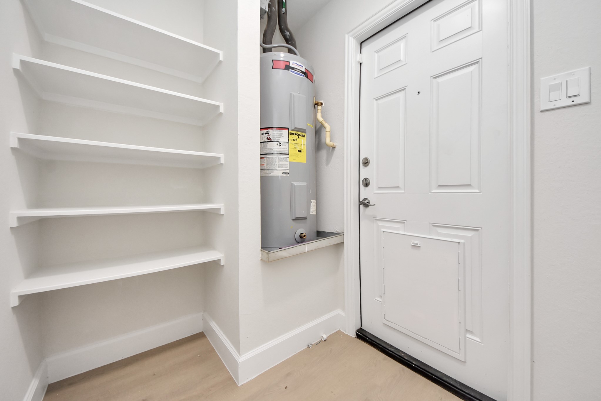 16124 Brettwood Lane Splendora, TX 77372 - Photo 29 of 40 a view of walk in closet with empty racks