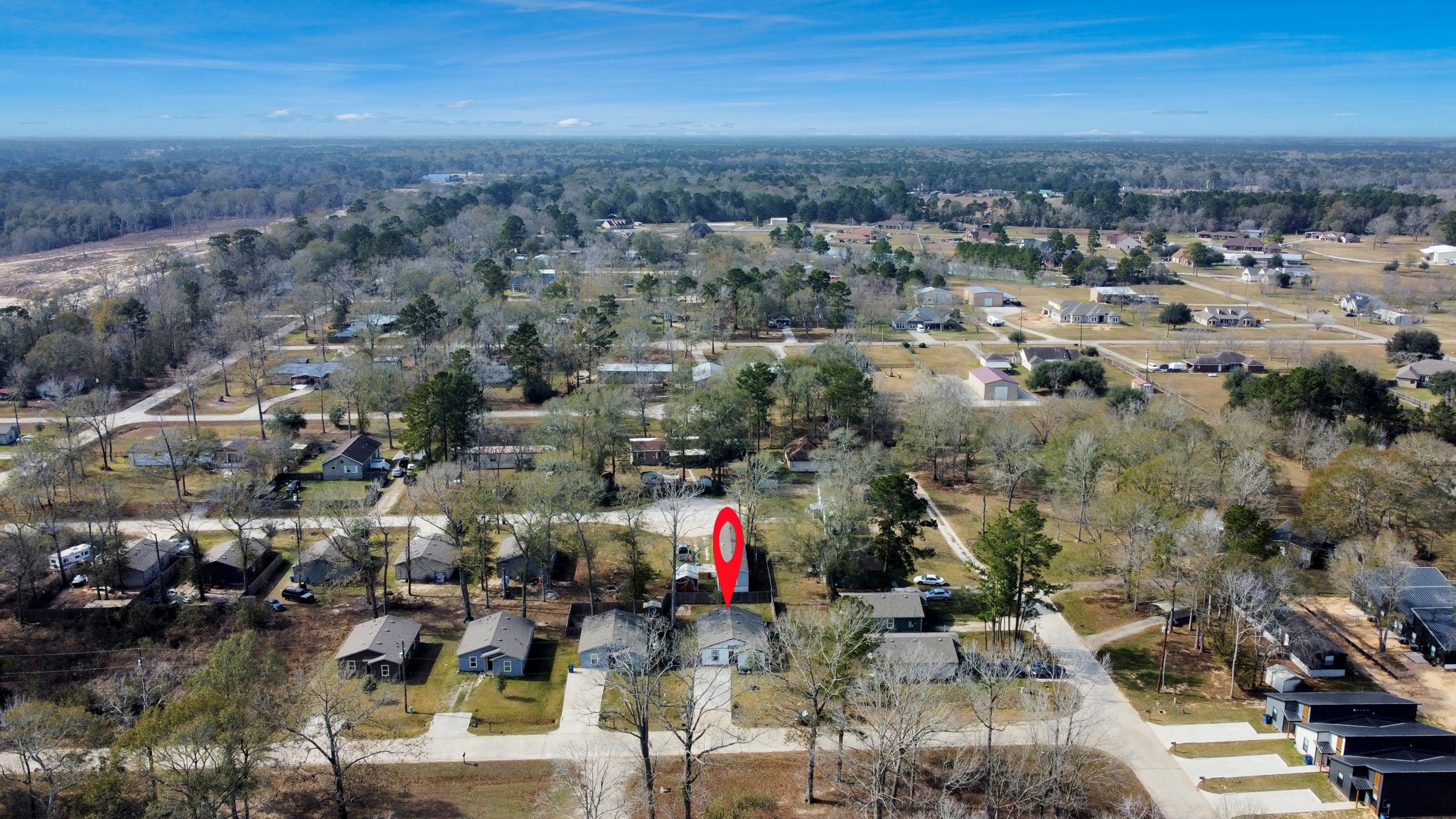 16124 Brettwood Lane Splendora, TX 77372 - Photo 39 of 40 an aerial view of residential houses with outdoor space