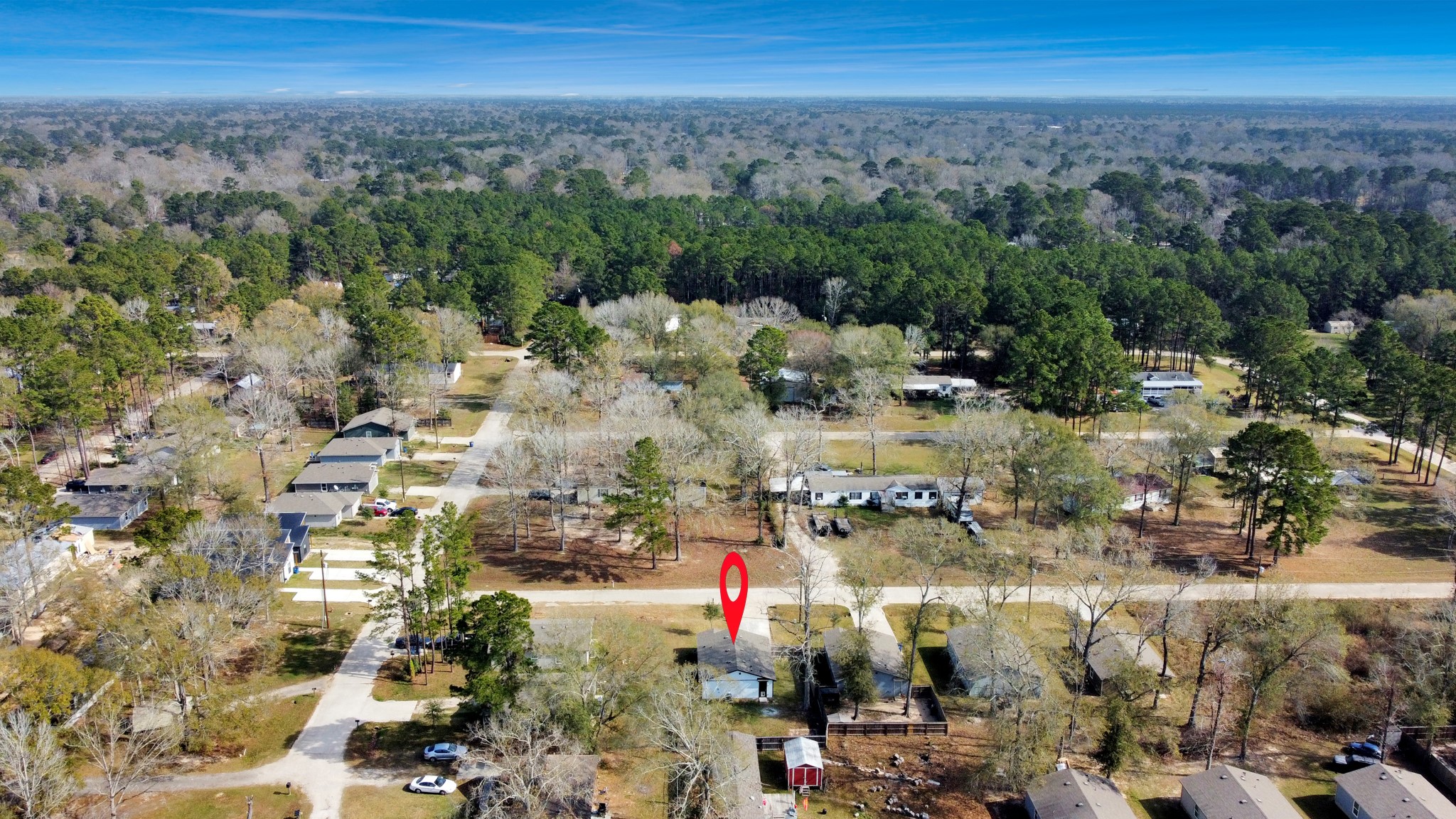 16124 Brettwood Lane Splendora, TX 77372 - Photo 40 of 40 Charming home nestled in a peaceful, wooded neighborhood with spacious lots. The property offers privacy and a serene environment, perfect for nature lovers. Ideal for those seeking a tranquil lifestyle.