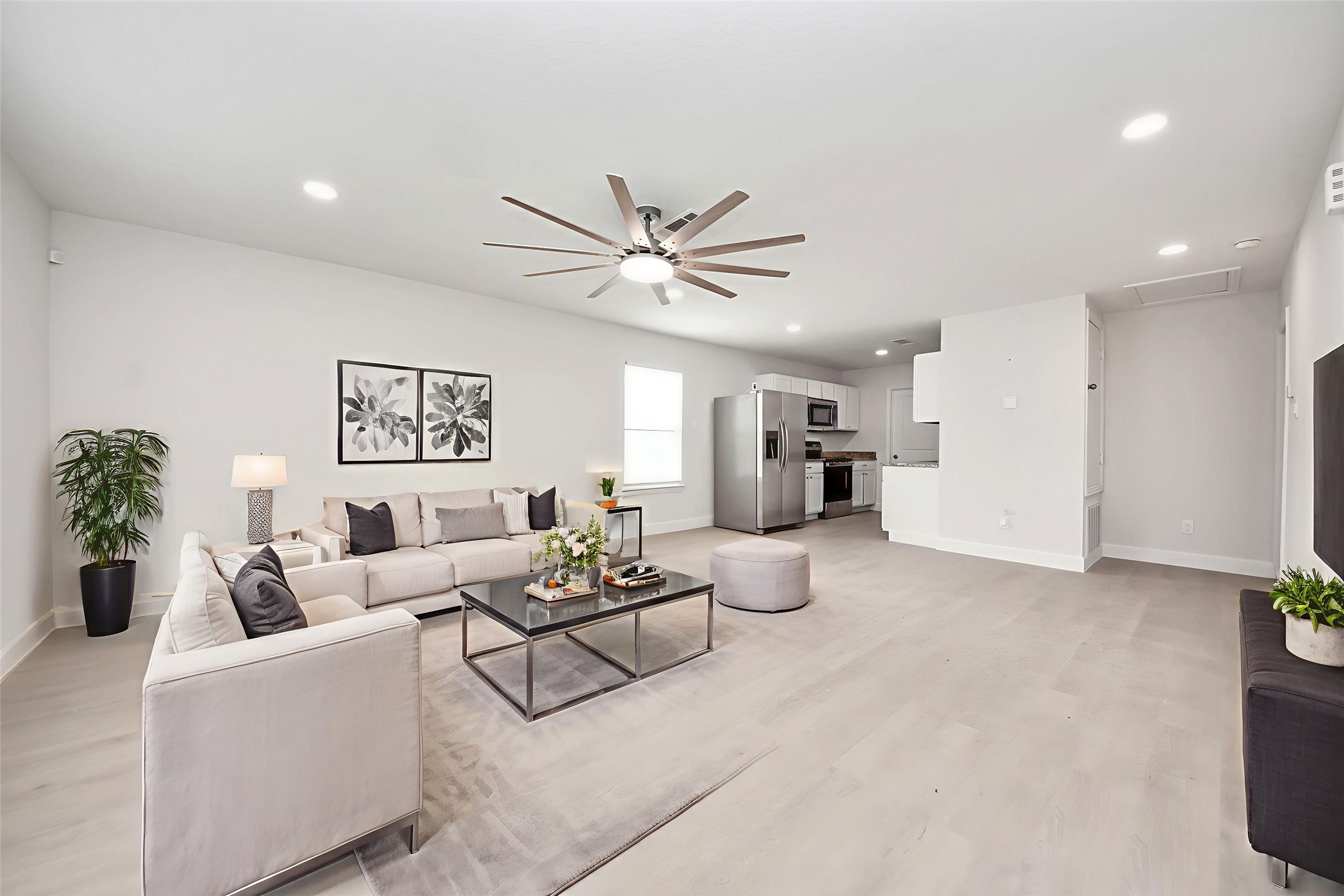 16124 Brettwood Lane Splendora, TX 77372 - Photo 4 of 40 a living room with furniture and white walls