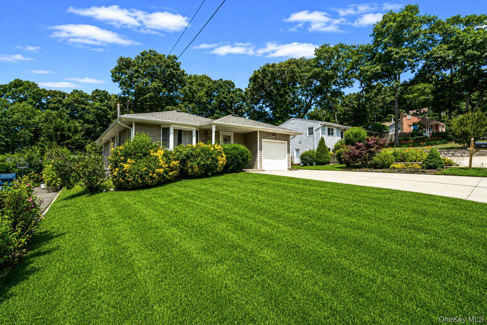 390 Blue Point Road Farmingville, NY 11738 - Photo 2 of 29
