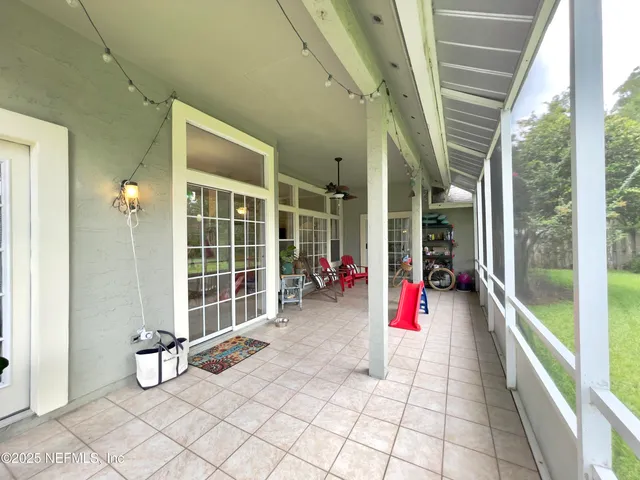 a view of swimming pool with seating space