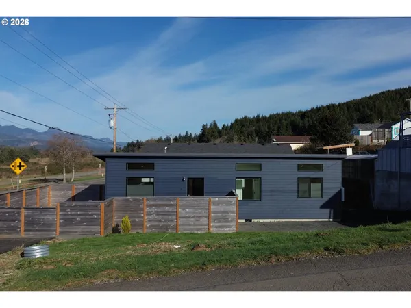 a view of a backyard with plants