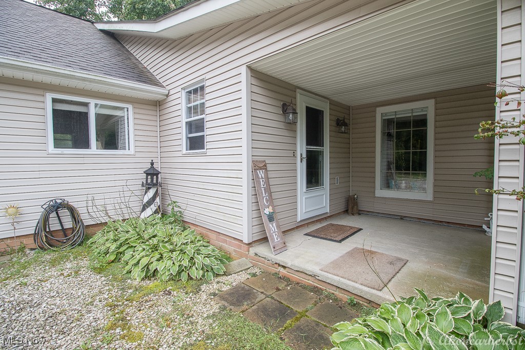 1667 Red Bird Road Madison, OH 44057 - Photo 2 of 44 Covered front door entrance