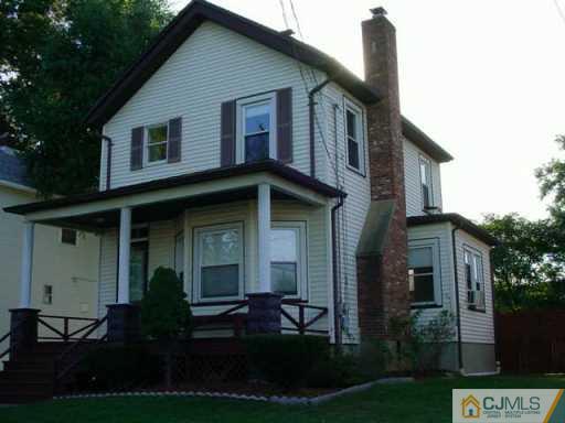 441 Front Street Dunellen, NJ 08812 - Photo 2 of 8 a view of a house with yard and plants