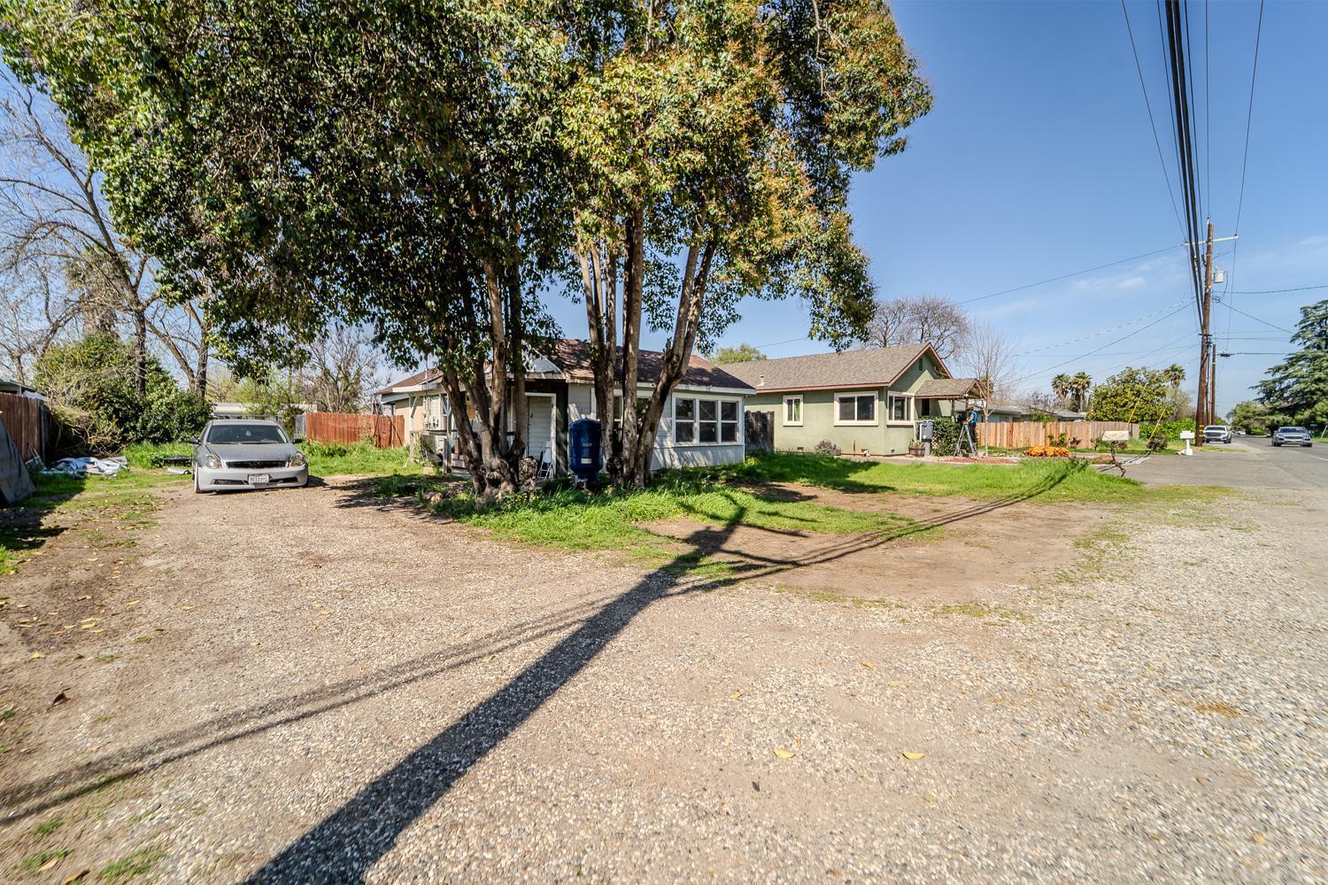 285 South Barrett Road Yuba City, CA 95991 - Photo 2 of 14 a view of a street with houses on both side of it