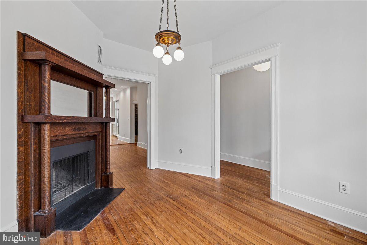 1105 G Street Southeast Washington, DC 20003 - Photo 13 of 51 Dining room view to entry hall and living room.