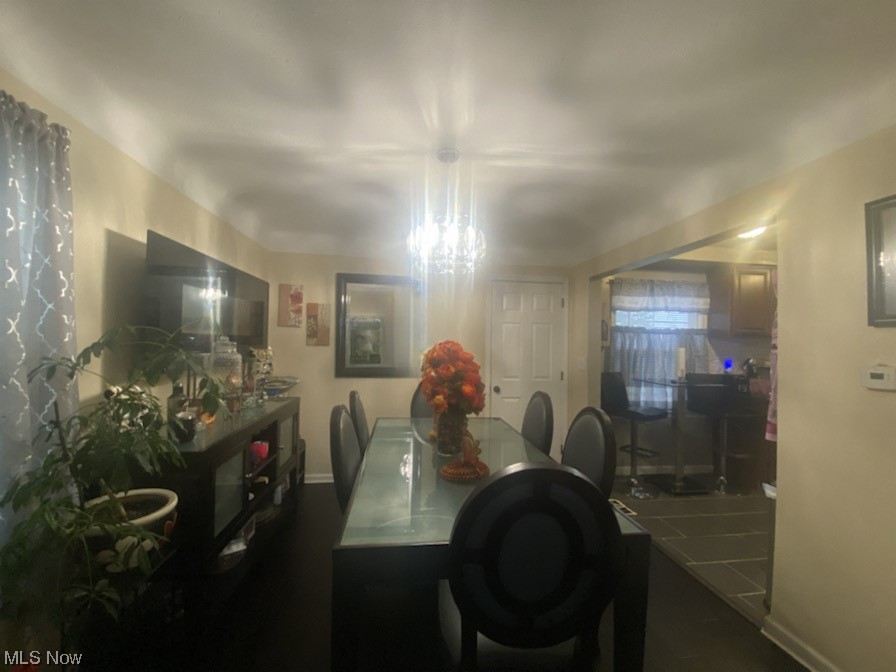 1500 Edgefield Road Lyndhurst, OH 44124 - Photo 7 of 24 Dining area featuring a chandelier