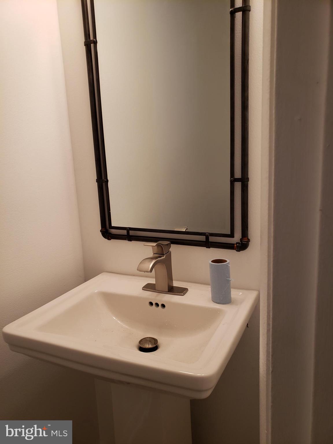 3116 Berry Road Northeast, Unit 22 Washington, DC 20018 - Photo 14 of 38 Half bath - main level