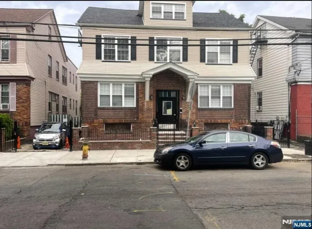 a car parked in front of a building