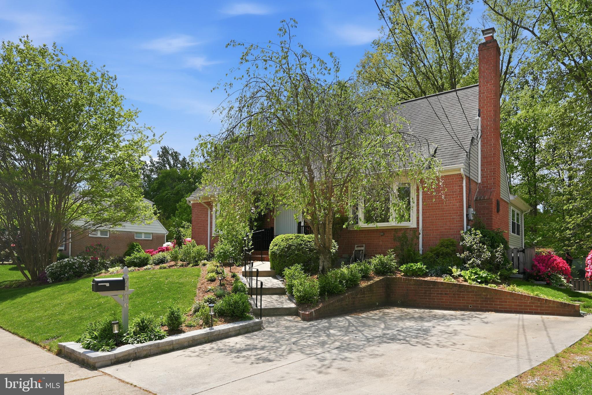 7006 Barnack Drive Springfield, VA 22152 - Photo 46 of 56 a view of a garden with pathway