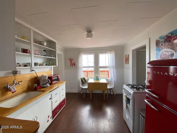 a bed room with furniture and a window