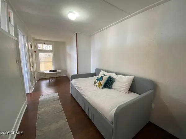 a bed room with a bed and a couch