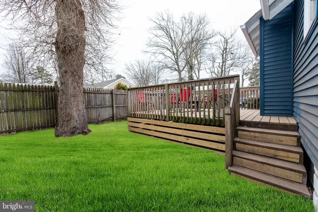 an aerial view of a houses with outdoor space