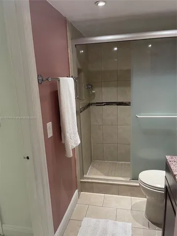 a bathroom with a toilet and a sink