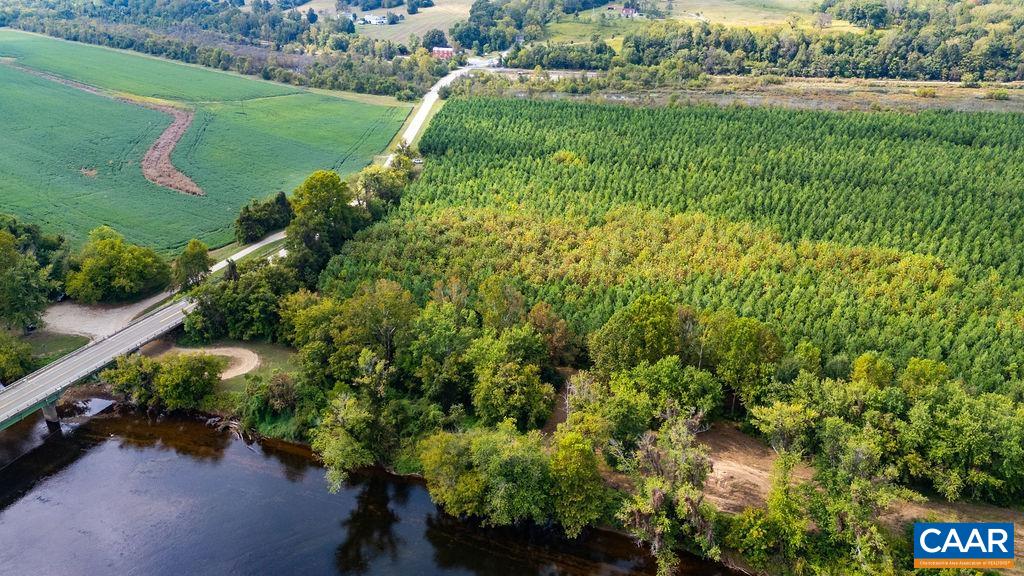 Tbd James River Road Wingina, VA 24599 - Photo 15 of 33 a view of a garden with a bench and trees