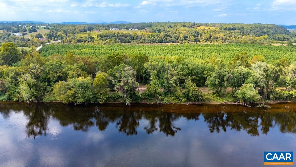 Tbd James River Road Wingina, VA 24599 - Photo 17 of 33 a view of a lake with a mountain and a yard in back