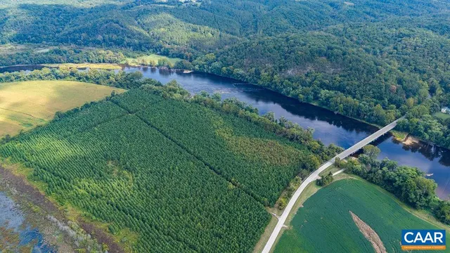 a view of a lake with a yard