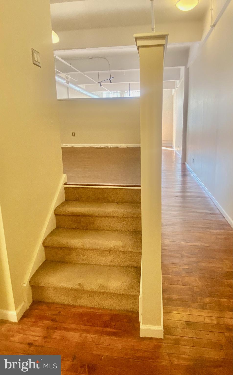 1228-32 Arch Street, Unit 5C Philadelphia, PA 19107 - Photo 11 of 34 a view of walk in closet with empty racks