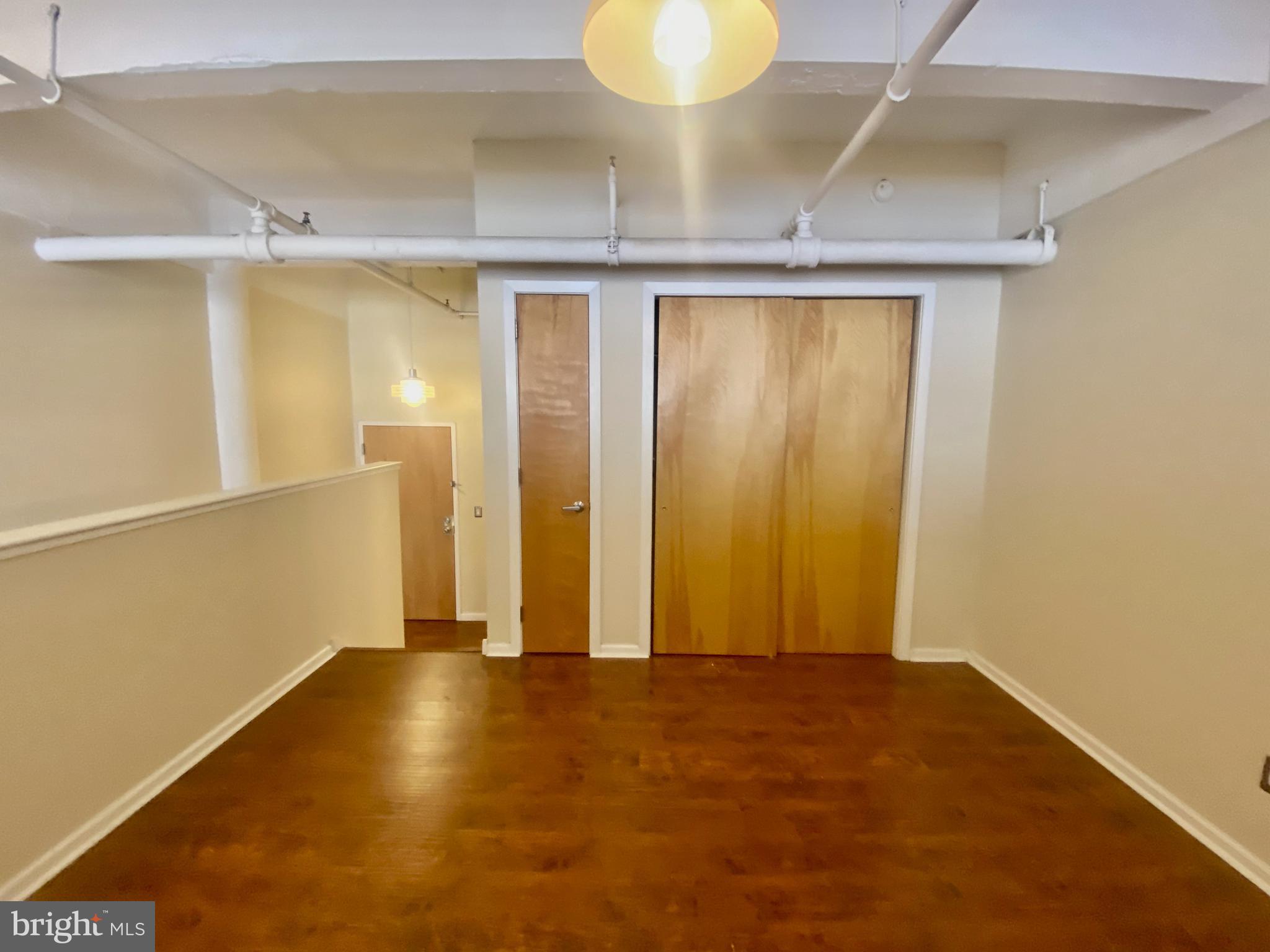 1228-32 Arch Street, Unit 5C Philadelphia, PA 19107 - Photo 15 of 34 a view of room with walk in closet