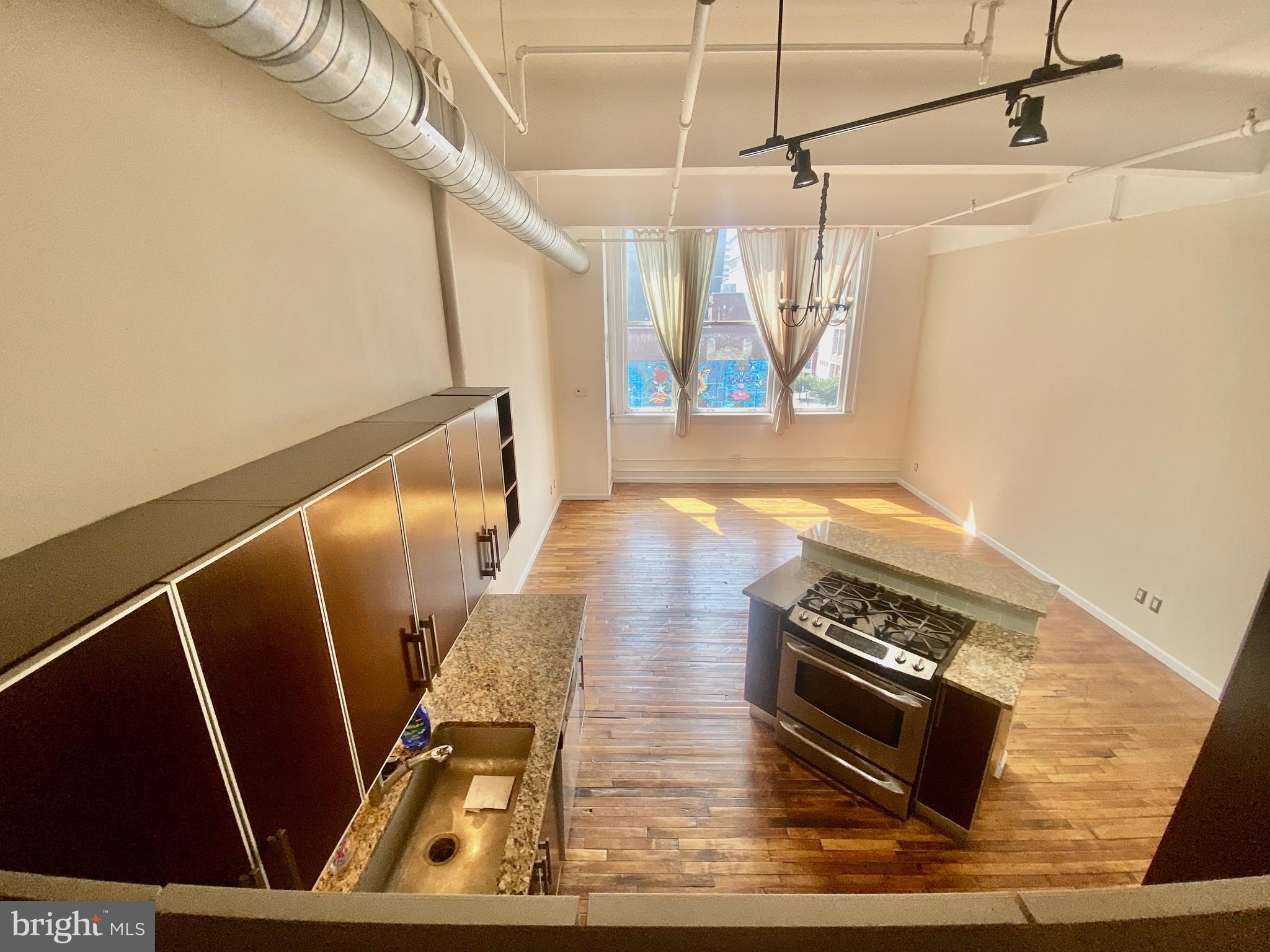 1228-32 Arch Street, Unit 5C Philadelphia, PA 19107 - Photo 17 of 34 a view of an outdoor space with seating area