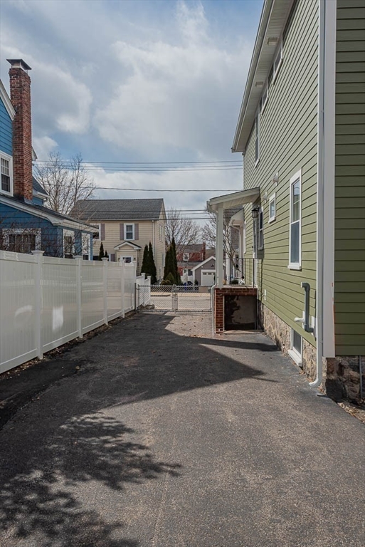 47 Chesbrough Road Boston, MA 02132 - Photo 39 of 42 a view of a street with seating space
