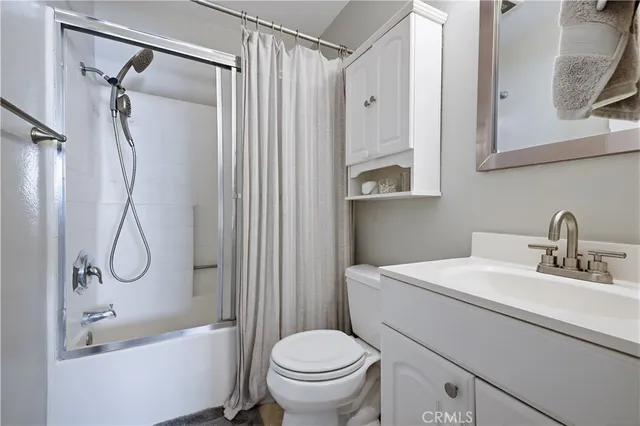 a view of a porch with wooden fence
