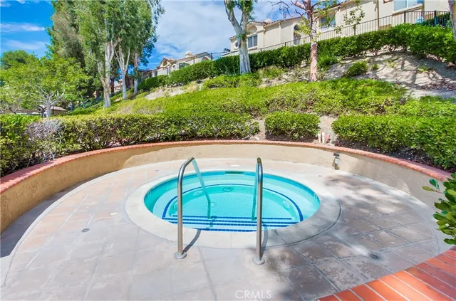 a view of a park with swings and slides