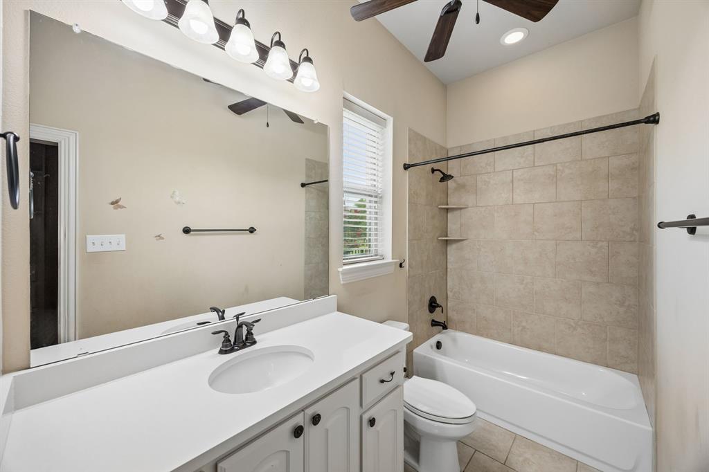 62 Trail Ridge Drive Melissa, TX 75454 - Photo 19 of 39 Bathroom #1 is inside of the guest bedroom and includes a large walk-in closet with built-ins