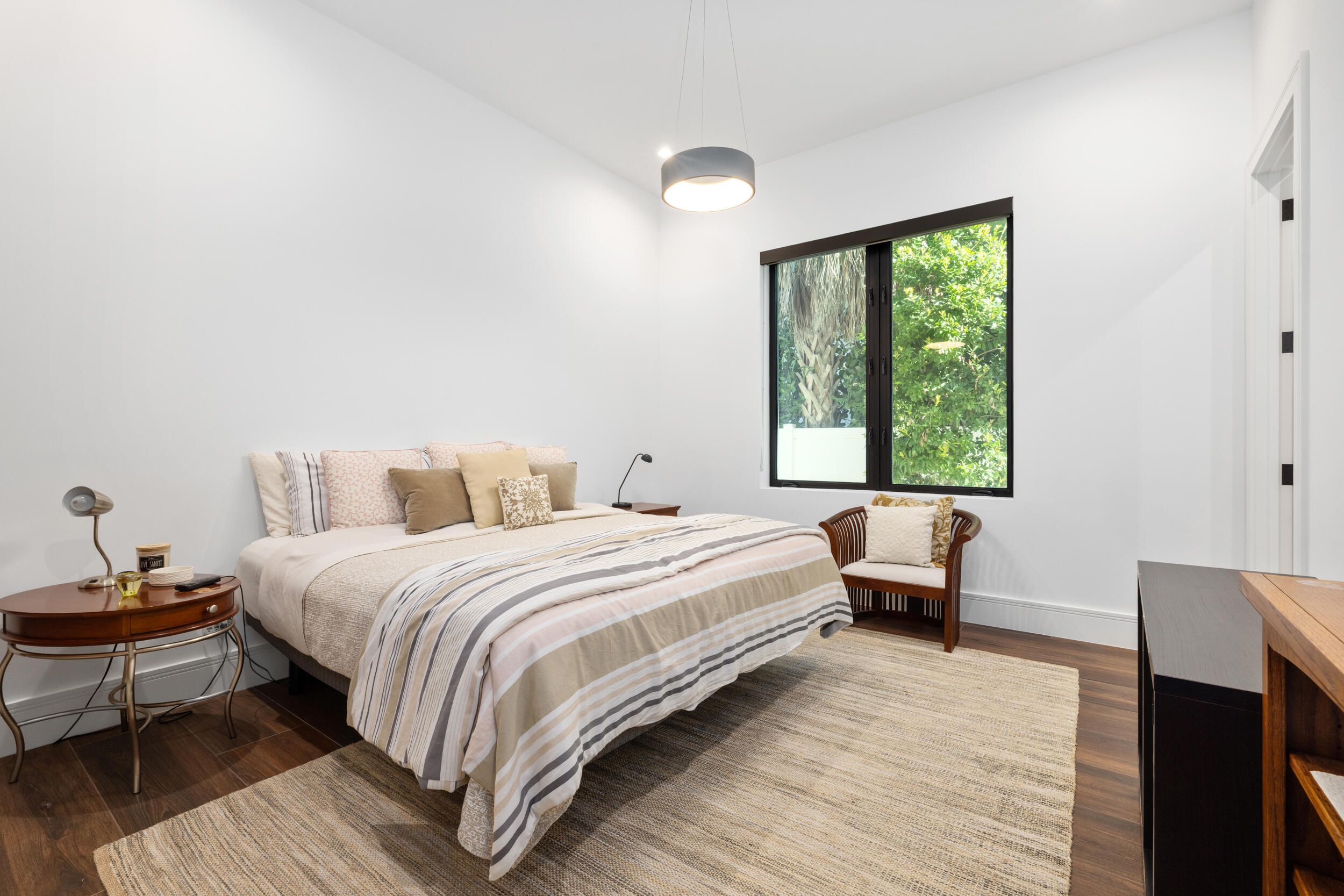 10 Coconut Road Delray Beach, FL 33444 - Photo 18 of 41 a bed room with a bed and a chair