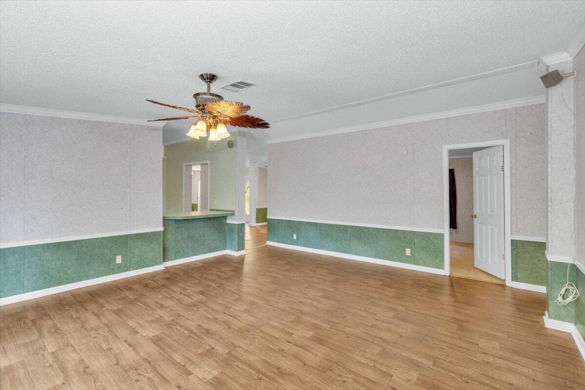 2544 Pineneedle Road Hephzibah, GA 30815 - Photo 27 of 49 Family room with view of kitchen and entrance to bedroom #2