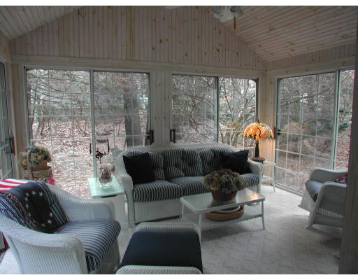 18 Woodridge Road Wellesley, MA 02482 - Photo 11 of 20 a living room with furniture and a large window
