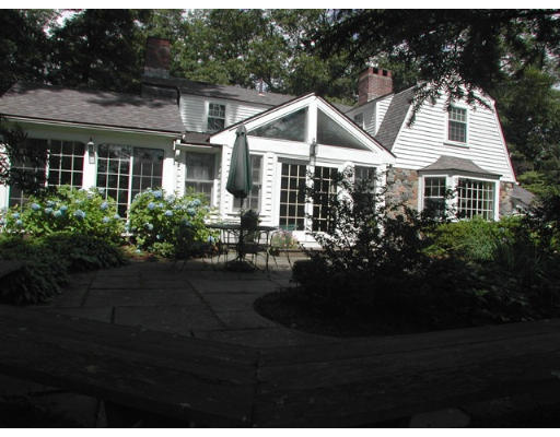 18 Woodridge Road Wellesley, MA 02482 - Photo 20 of 20 a front view of house with yard and green space