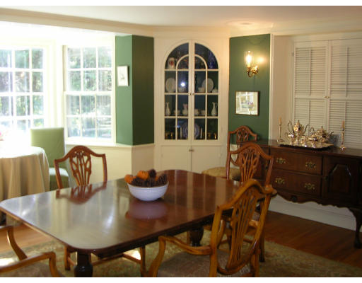 18 Woodridge Road Wellesley, MA 02482 - Photo 4 of 20 a view of a dining room with furniture and window