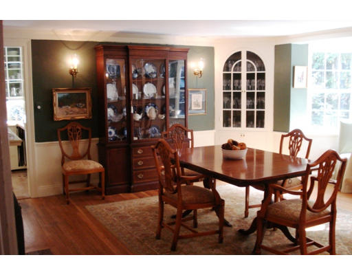 18 Woodridge Road Wellesley, MA 02482 - Photo 5 of 20 a view of a dining room with furniture and chandelier