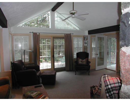 18 Woodridge Road Wellesley, MA 02482 - Photo 9 of 20 a living room with furniture and a large window