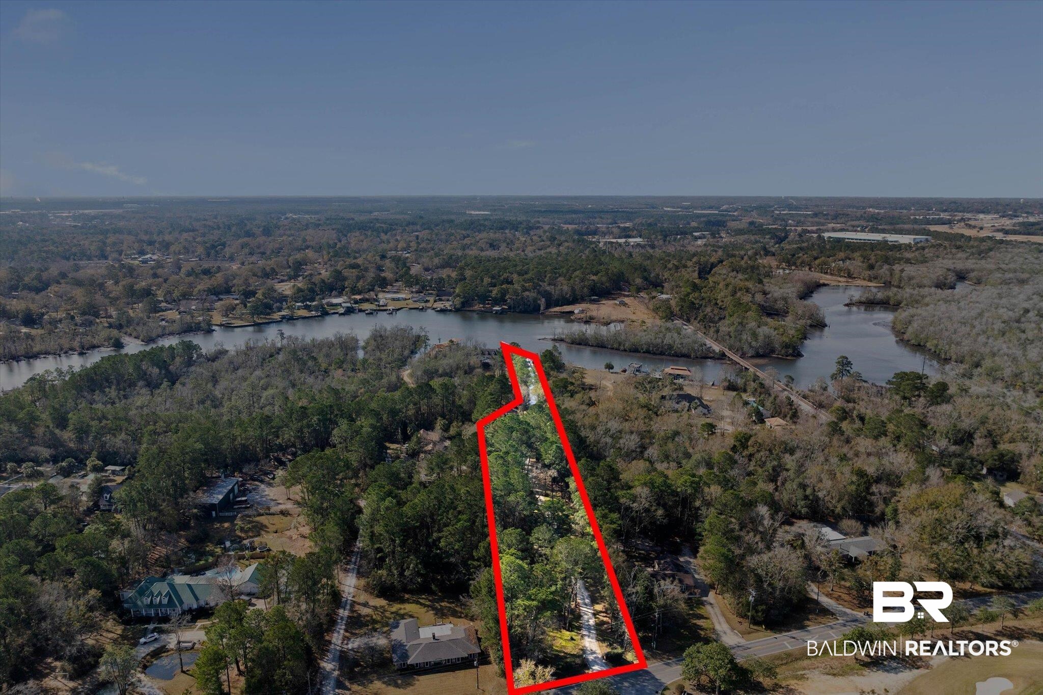 3847 Riviere Du Chien Road Mobile, AL 36693 - Photo 45 of 51 Aerial view of property and surrounding area featuring a nearby body of water and property boundaries highlighted