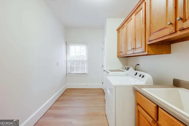 a spacious bathroom with a bathtub and shower