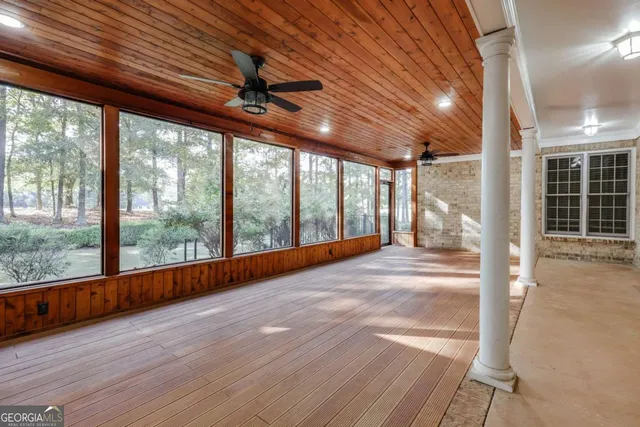 a bathroom with a shower and a toilet